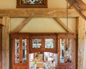 122-09 Wood : Wild Cherry; Finish : Candlelight; Door Style : Craftsman, pegged; Face Frame : Square Inset
